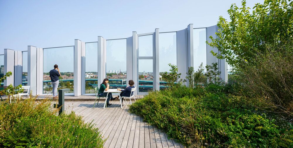 Greened rooftop surfaces provide attractive retreats in the heart of the city.